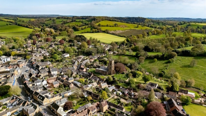 Beaminster, a charming small town in West Dorset, set in a scenic valley surrounded by rolling hills and green countryside.