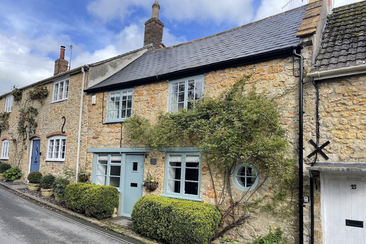 Blackbird Cottage, a dog‑friendly holiday cottage in Beaminster, shown with its cosy Dorset setting and countryside surroundings.